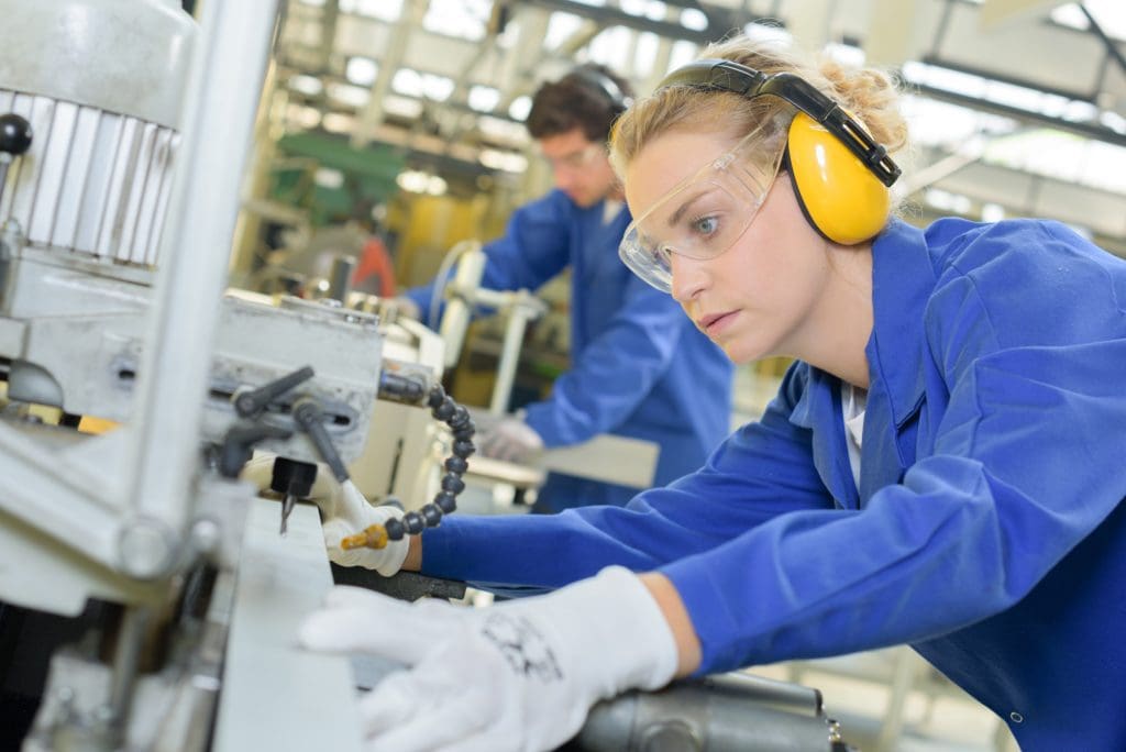 Workers Working at Manufacturing Plant - Industrial Maintenance Industrial Leak Repair
