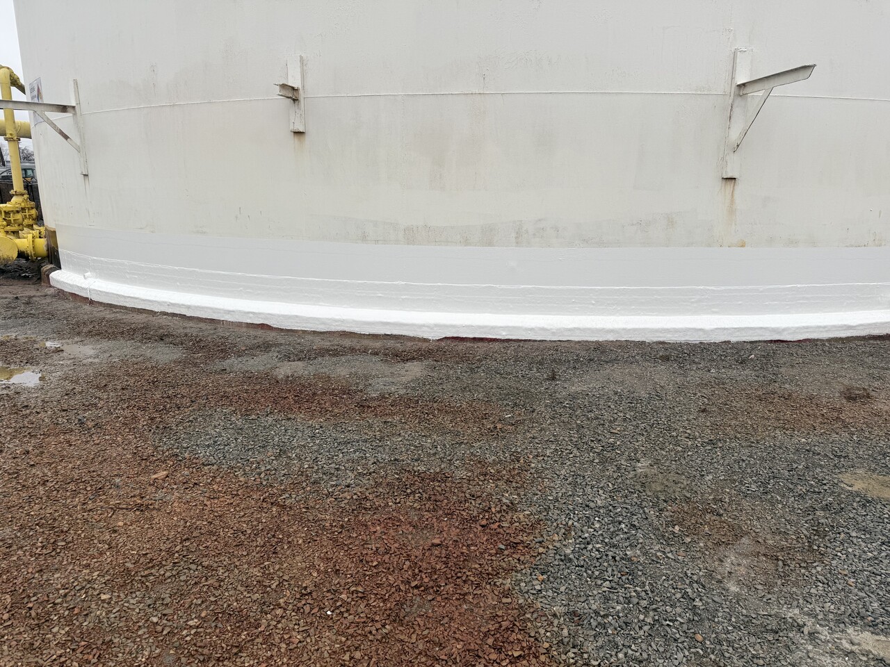 Tank floor after composite rehabilitation showing restored and reinforced surface