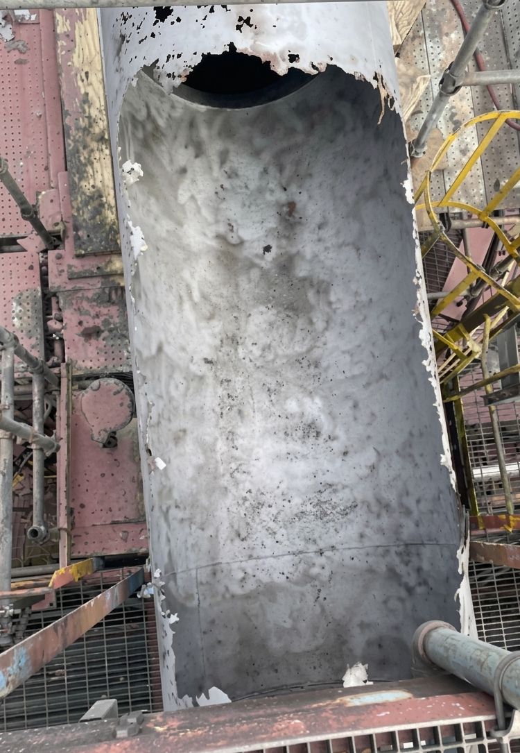 Corroded industrial piping before repair