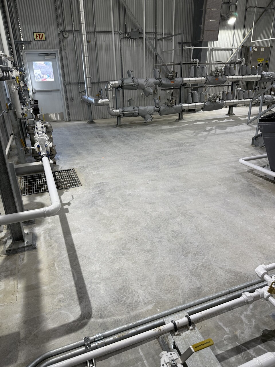 Damaged concrete floor before repair