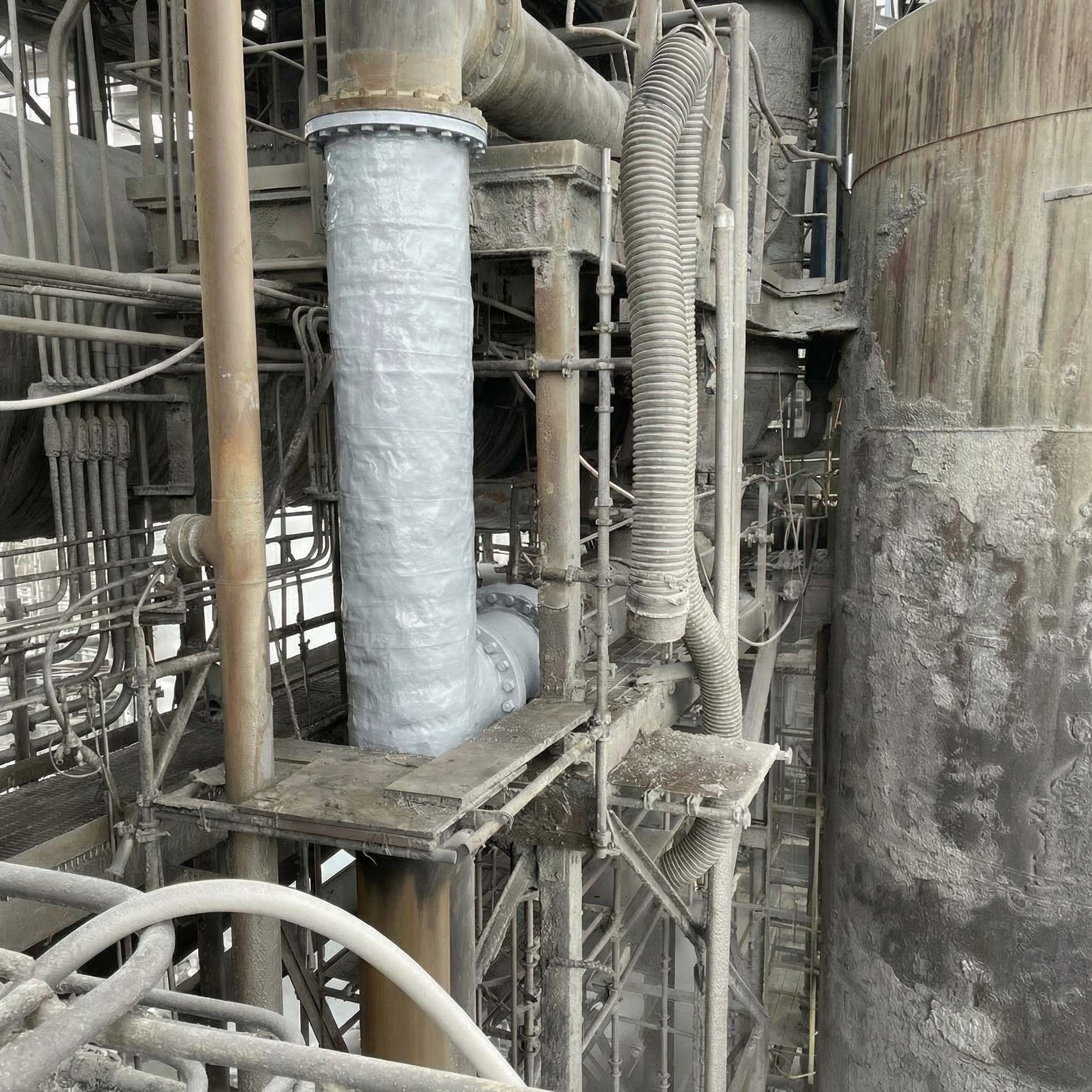 Abrasion resistant industrial coating applied to protect high-wear equipment