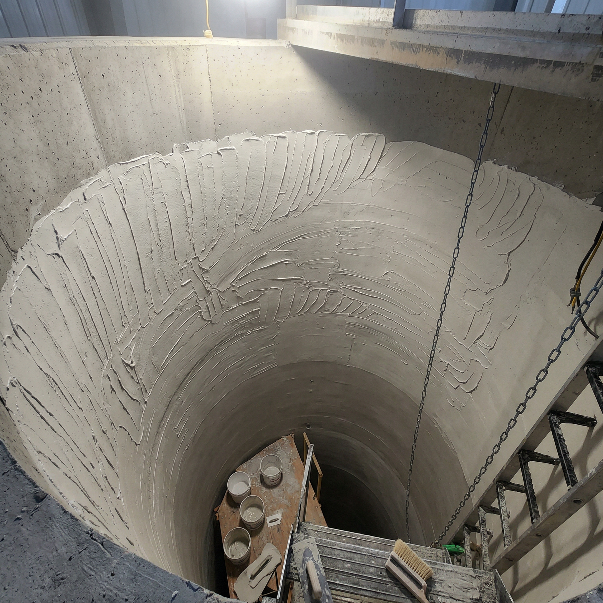 After trowel-applied lining showing restored tank surface